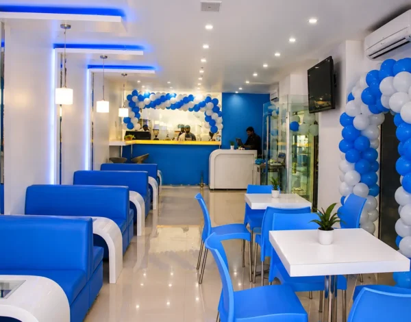 Premium café lounge interior designed by Grand Archinex featuring modern seating, elegant lighting, spacious dining layout, and contemporary hospitality interiors.