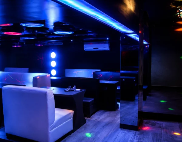 Premium nightclub lounge interior designed by Grand Archinex with luxury seating, ambient LED lighting, and modern commercial interiors.